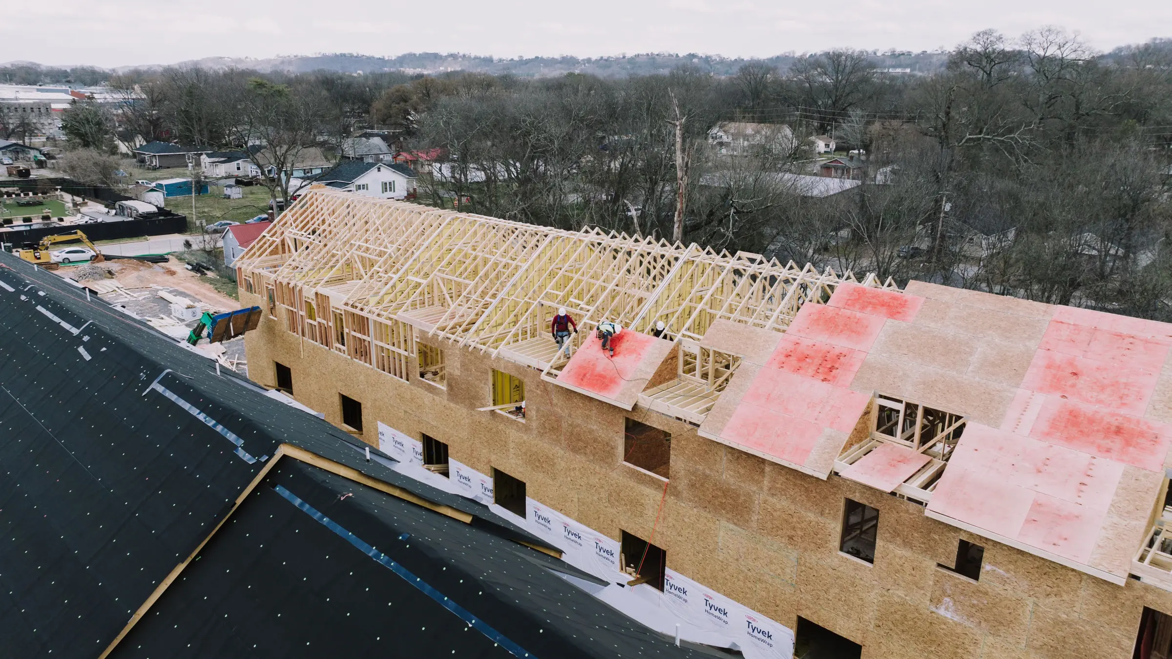 Aerial view of a multi-residential wood-framing project under construction