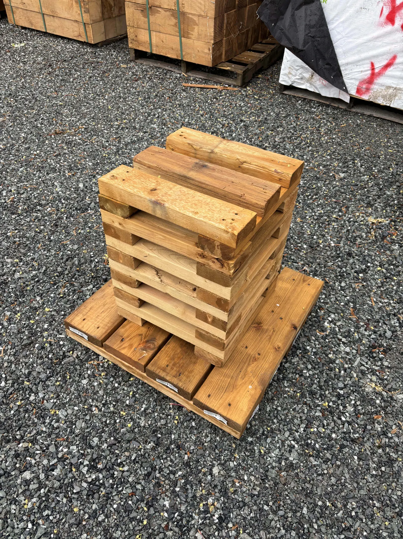 Treated wood cribbing blocks stacked for foundation support