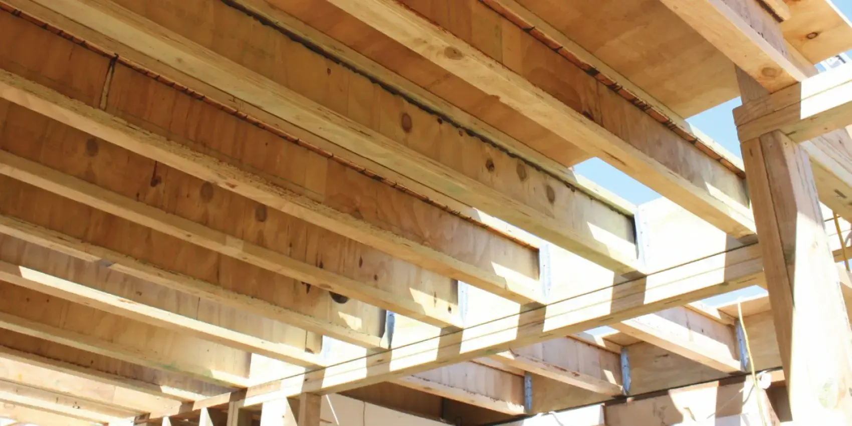 Engineered wood I-joists installed in a floor system