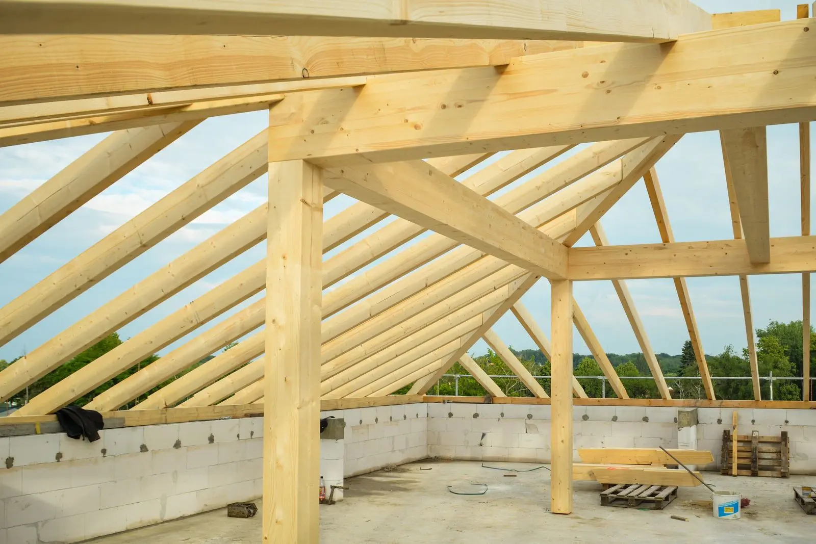 Wood roof trusses and rafters on a building under construction